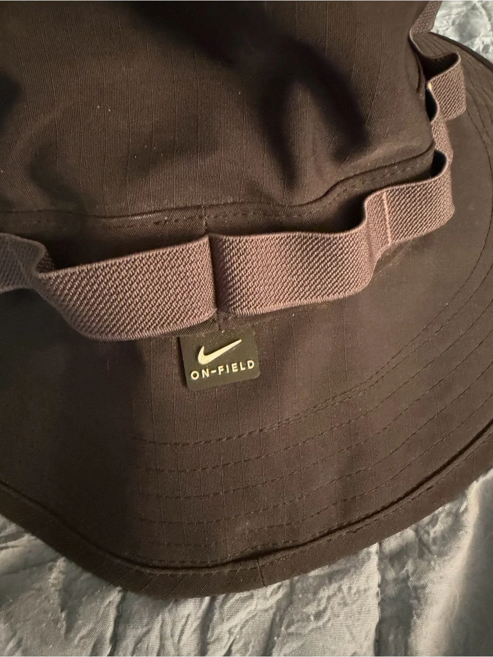 Nike On-Field Black Sideline Bucket Hat with Gold Swoosh
